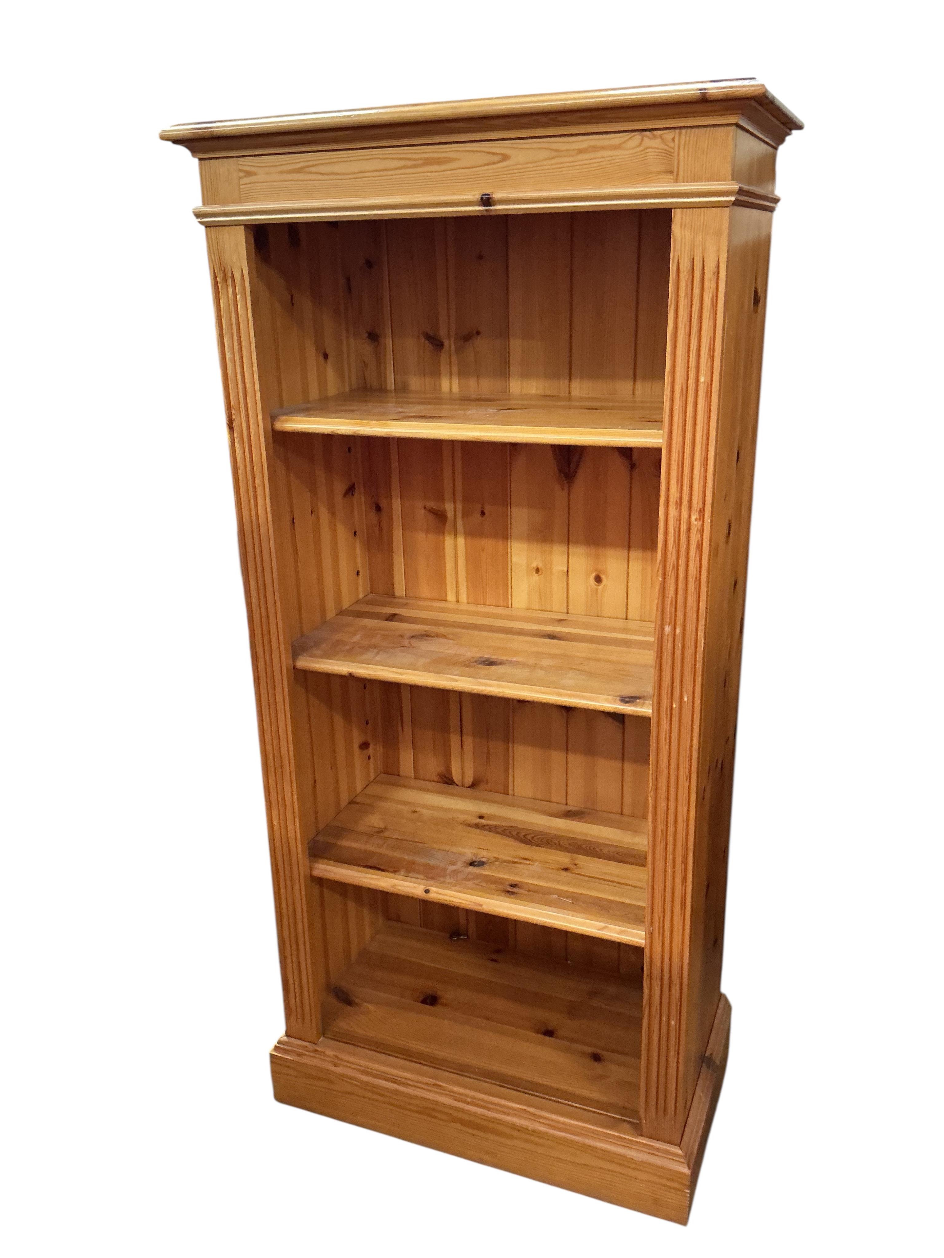 Two modern pine open bookcases, larger width 66cm, depth 35cm, height 138cm